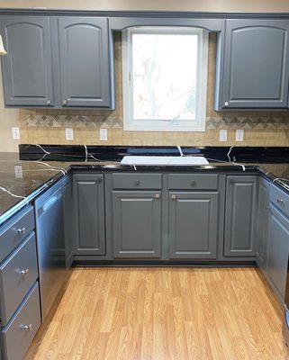 These cabinets were peeling and in rough shape before our team stepped in to make them beautiful!