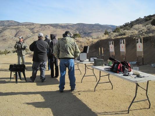 John providing instructions as we prepare to demonstrate our competence with firearms.