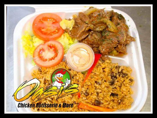 Yellow Rice and Onion Cubed Steak on Red Sauce  Arroz Con Gandules con Bistec Encebollado en Salsa