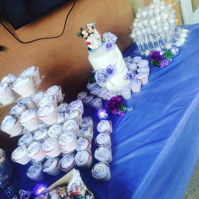 Mickey and Minnie wedding with a 2tier cake, cupcakes and cake pops lavender/silver color theme