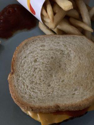 This is the TOASTED burger. It's stale white bread and NOT toasted. Idiots work here!