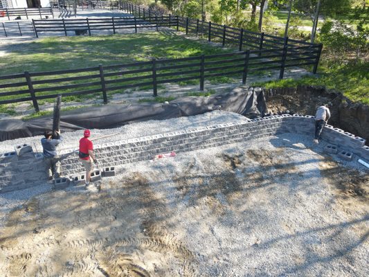 Retaining wall and HDPE horse fence