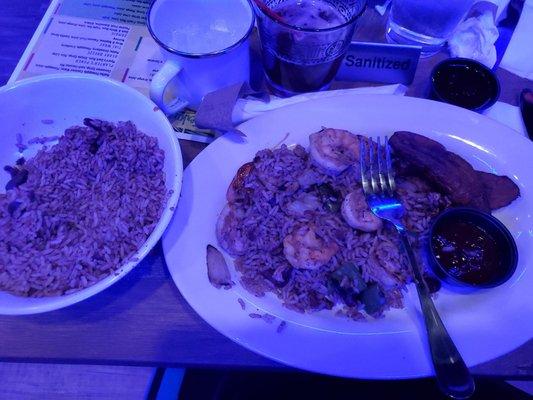 Jerk grilled shrimp with rice & peas...rum sauce on the side taste like a basic BBQ sauce otherwise food very good.