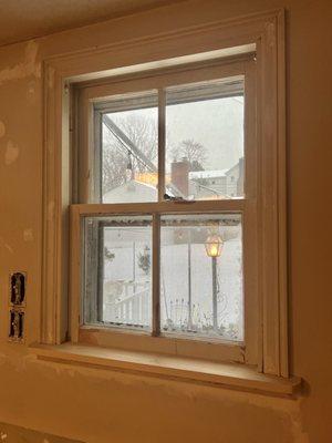 24 hours ago we had a shattered, unglazed pane in an odd corner window. All fixed, just in time for the storm!