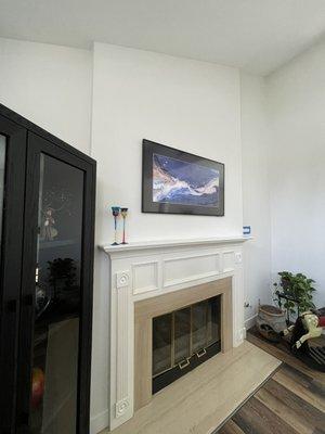 Fireplace mounted Frame TV with wire concealment