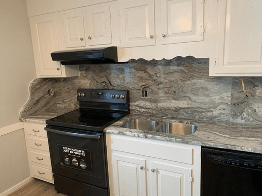 Luxurious kitchen with full back splash