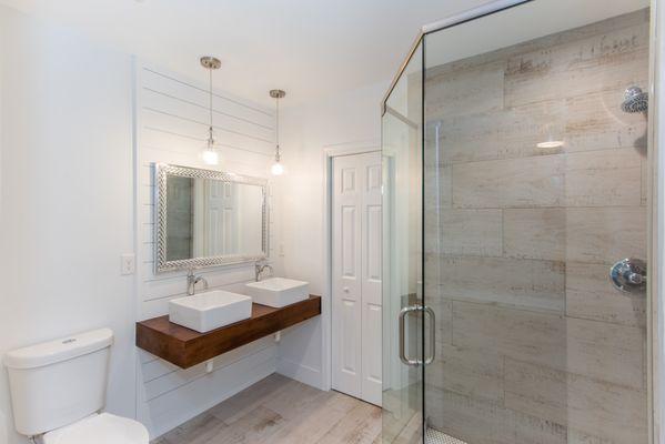 Our in-house master carpenter produced this incredible poplar vanity for our client's master bath renovation.