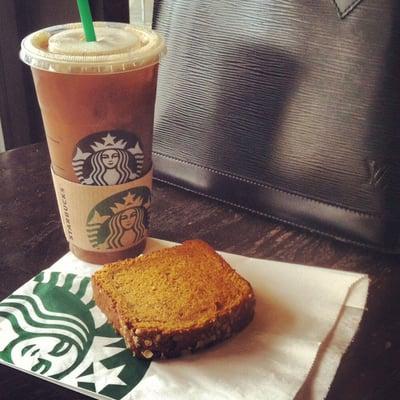 Warmed pumpkin bread and iced coffee.