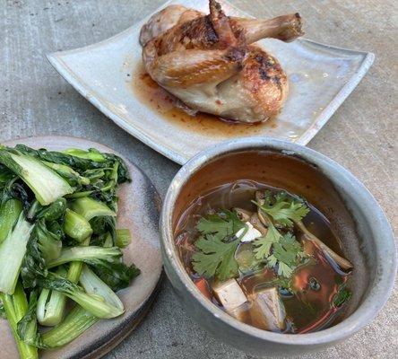 Thai style 1/2 chicken with Nam prik plau, steamed pak choi, and vegan hot and sour soup as a meal pickup