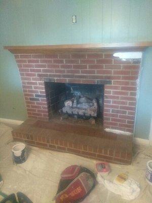 Before picture of a fireplace makeover