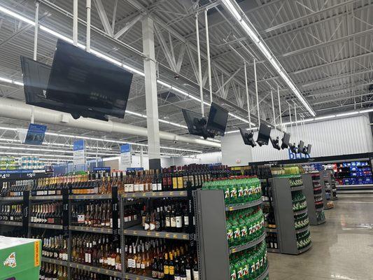 Overview monitors mounted inside of a Walmart