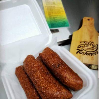 Alcapurria de Carne: Plantain fritter filled with seasoned ground beef