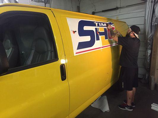 Installing vehicle graphics.