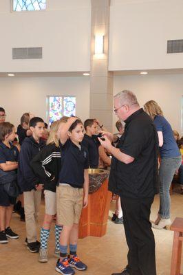 Ash Wednesday - students receive ashes as a reminder of Jesus' sacrifice for us