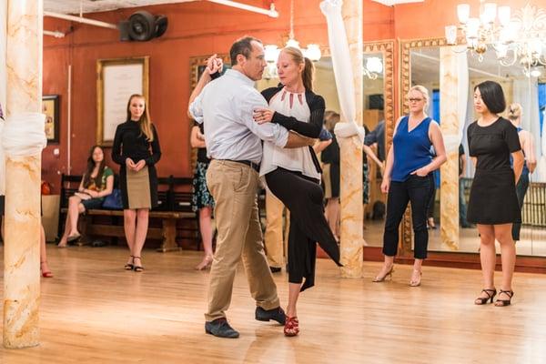 Studio owner Carina Moeller teaching with Dante Polichetti.
  
  Photo courtesy of Manhattan Sideways (sideways.nyc). Photo by Thomas Arena