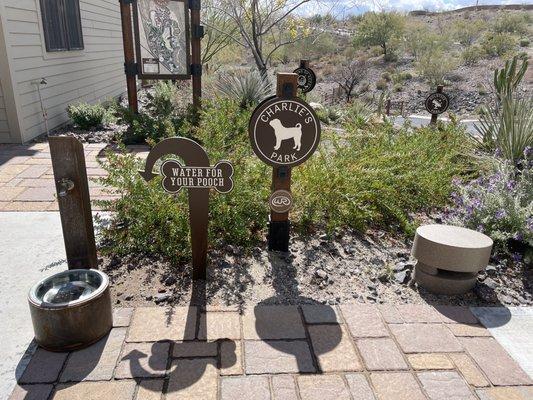 Visitor center featuring dog water station and park.