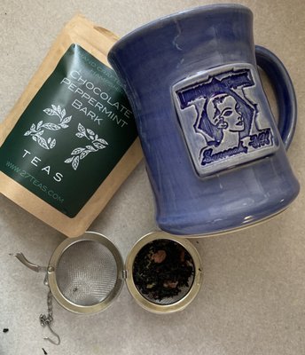 Tea & hand thrown pottery mugs.