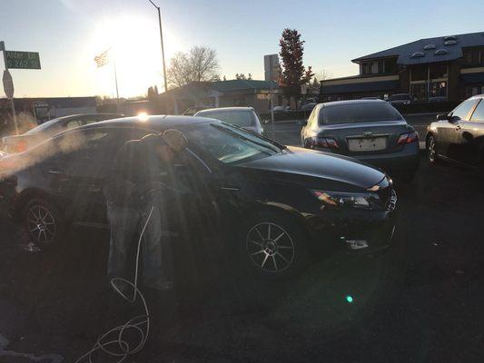 2014 Kia Optima I bought from these guys getting detailed.