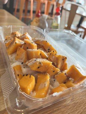 Mango sticky rice. Big portion and it's under $10.