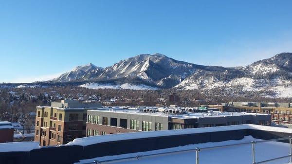 The Flatirons in winter, taken atop our Boulder office.