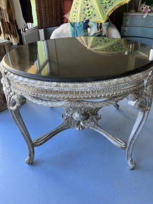 A beautiful round table with marble top perfects this upcycled look.  Chalk paint with several waxes .