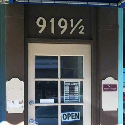 closeup of door to the stairs up to the shop