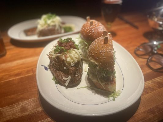 Side view of loaded baked potato and veggie burger