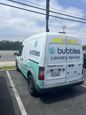 Your laundry is picked up & delivered in branded vans!