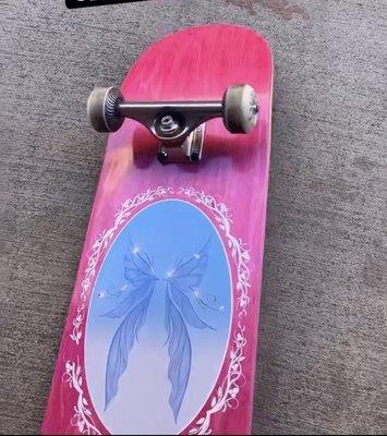 Pink skateboard by April skateboards. Rayssa Leal deck, hollow Independent trucks, 54mm spitfire wheels, and Bones Reds bearings.