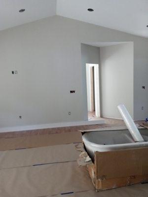 Drywall insulation and trim interior and exterior painting floating floor installation