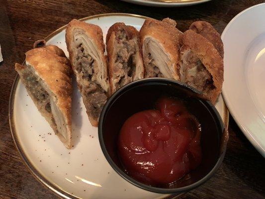 Cheesesteak spring rolls.