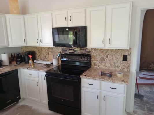 Refinished Kitchen Cabinets and handles