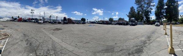 Parking lot full of trucks.