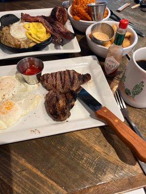 Ribeye and eggs with country potatoes and big breakfast bowl with sweet potato fries