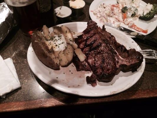 T-bone steak with a little bite missing