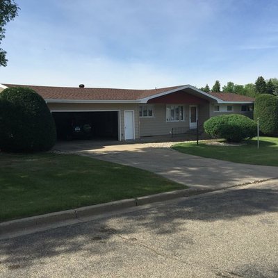 Trimmed the shrubs around the front and back of house.