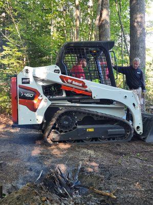 Im filling dirt in new drive way and culvert I just installed and leveling a quarter acre of Property.