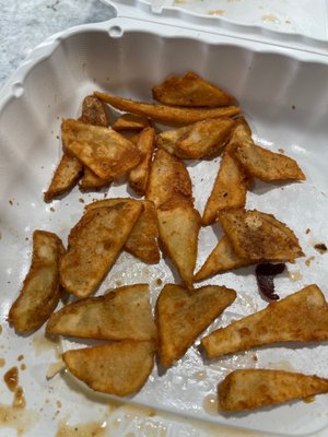 Crunchy, over cooked wedges.. Or at least we think they're wedges?