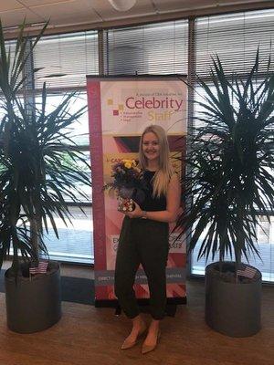 Celebrity Staff Omaha Account Manager Jessica H. receiving flowers from a candidate who was grateful for her help in finding ...