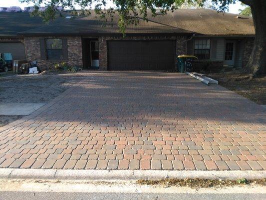 This paver driveway is in Mandarin, Jacksonville Florida. The paver color is Ortega.