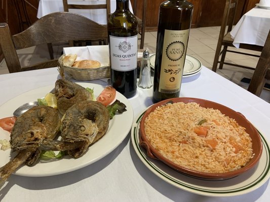 Fried "pescatarian" or whiting with tomato rice. Another hit!