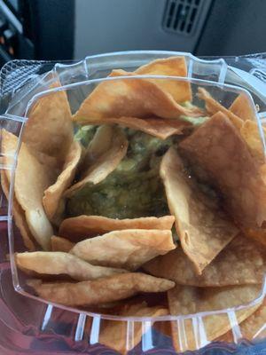 Homemade guacamole  and pita chips