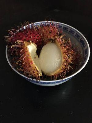 Rambutan. Fun to pop open and taste like sweet peeled grapes.