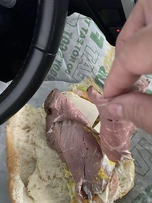 The two pieces of roast beef pulled apart