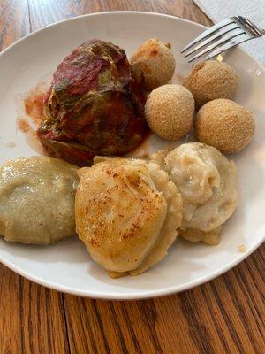 My plate of cabbage roll, Reuben balls and pierogies! Heated up items from their market.