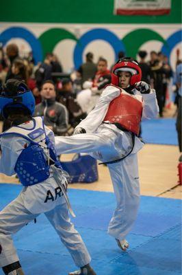 Olympian Tae Kwon Do student (RED) competing @ Twin Tigers Tournament in Oxnard, CA 3/11/2023