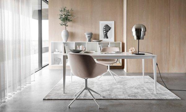 The Vienna chair in sand velvet fabric, and Torino dining table in white by BoConcept