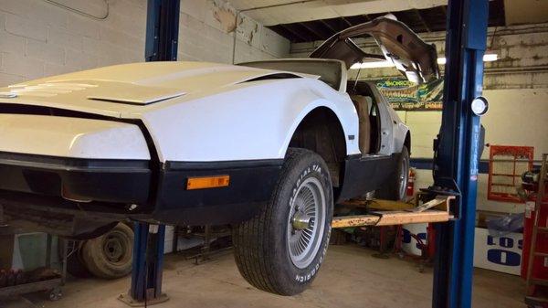 A Bricklin being worked on.