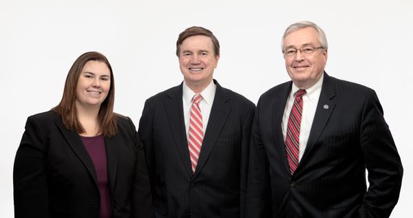 The partners at SKB Attorneys. From left: Kelly Bardon, David Spillane, and Dan Gibson