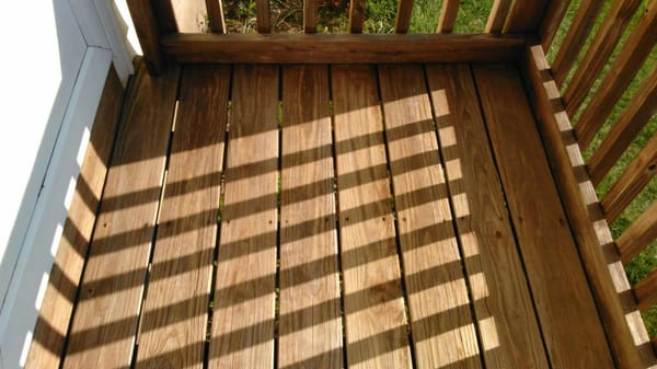 This front porch was black and green this is after a high pressure washer using only cold water